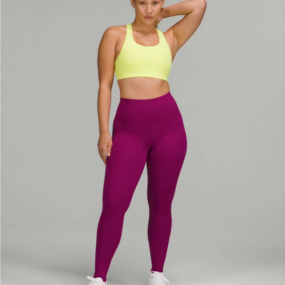 Lululemon Wunder Train Contour Fit High-Rise Tight 28"
Magenta Purple size 6
